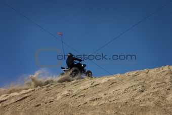 ATV/OHV rider riding sand dunes