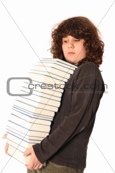boy carrying books on head