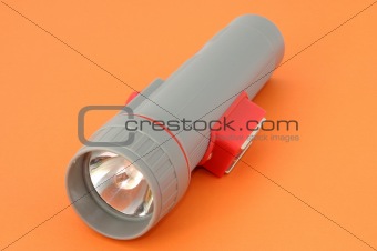 flashlight on orange