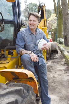A happy smilng construction worker.