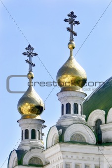 Orthodox crosses on blue sky background
