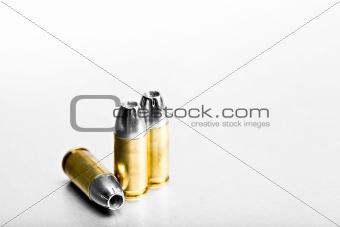 bullets on brushed metal
