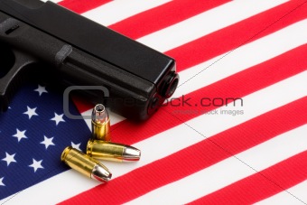 gun over american flag