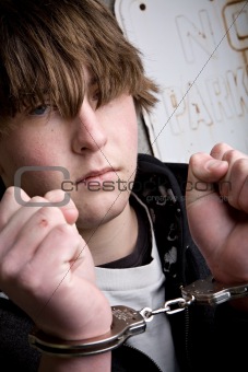 teen in handcuffs - crime