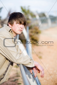 teen on fence portrait
