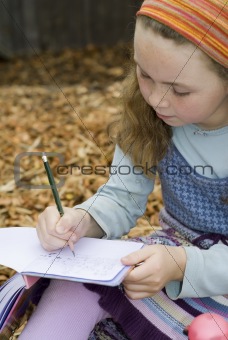 Girl writing in diary