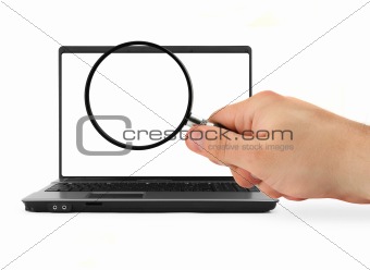 hand with blank magnifying glass and notebook