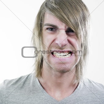 Man gritting one's teeth