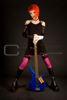 Romantic girl with bass guitar 
