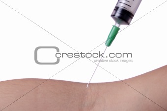 Close up of syringe needle before taking blood