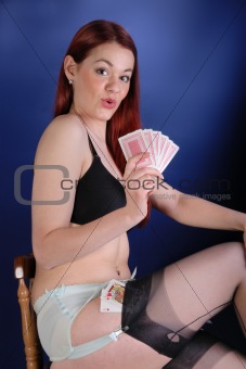 fifties cheesecake girl with playing cards