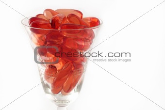 Colorful capsules in glass