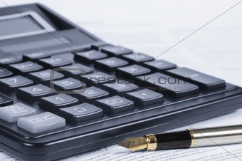 Calculator, pen, papers