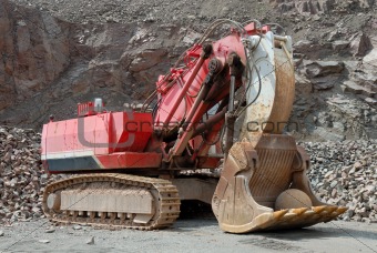 Excavator in a stone pit