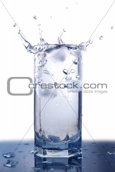 Splashing ice cubes in the glass