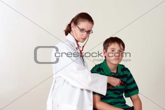 Doctor assessing patient by stethoscope