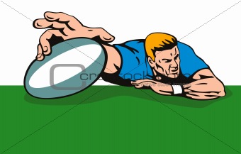 Rugby player diving to score