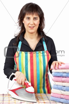 Housewife close to towels stacked