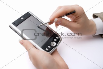 Woman hands holding pda and stylus