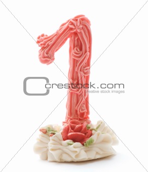 Number one made of marzipan over white