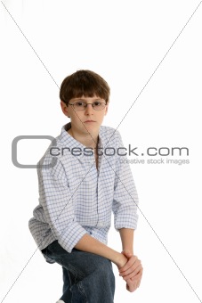 casual boy with arm resting on knee