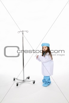 Doctor toddler with I|V stand and stethoscope