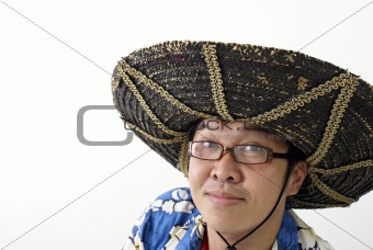 Asian tourist with mexican hat
