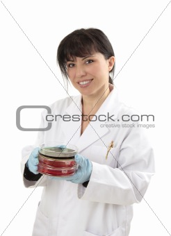 Scientist carrying petri dishes