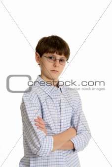 Boy with glasses and arms crossed