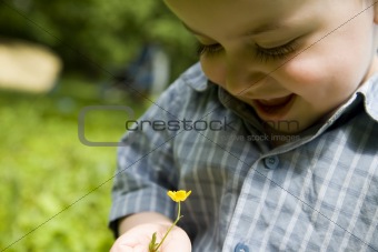 Happy Baby With Flower