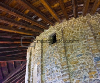 stone wall and wood roof