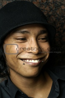 Smiling asian man with hat