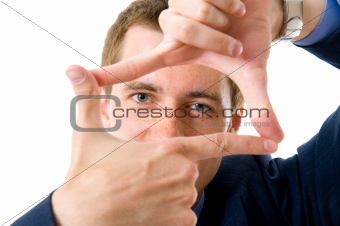 Businessman making a frame with his hands