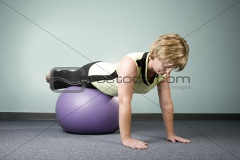 Woman Balancing on an Exercise Ball