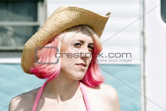 Woman in front of Travel Trailer