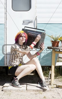 Girl Sitting on a Trailer Step
