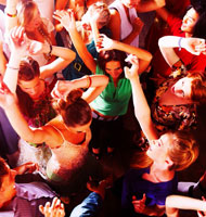 Top view of a group of people dancing in a bar or nightclub at a party